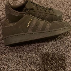Olive green superstar adidas.